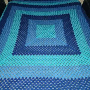 Afghan pic is on a queen bed